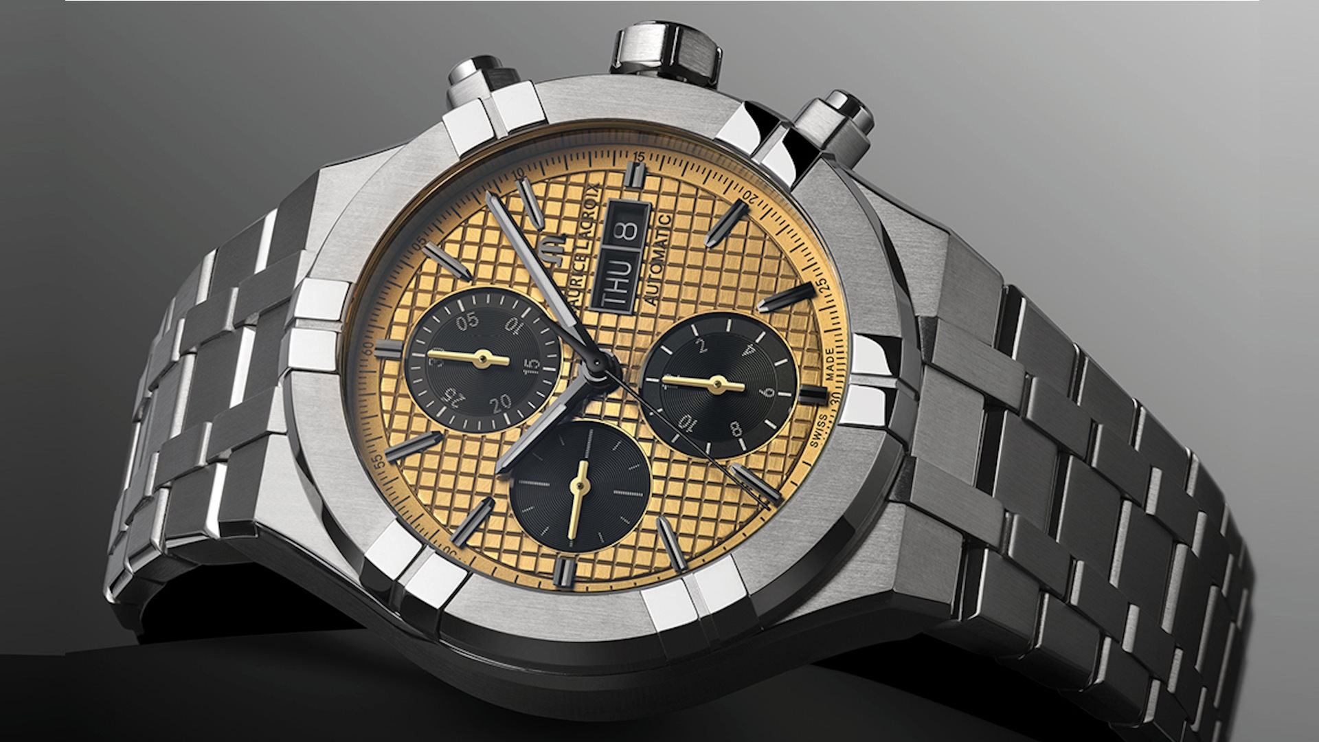 Ein intensiver Goldton macht den Aikon Automatic Titanium Chronograph zum Blickfang.